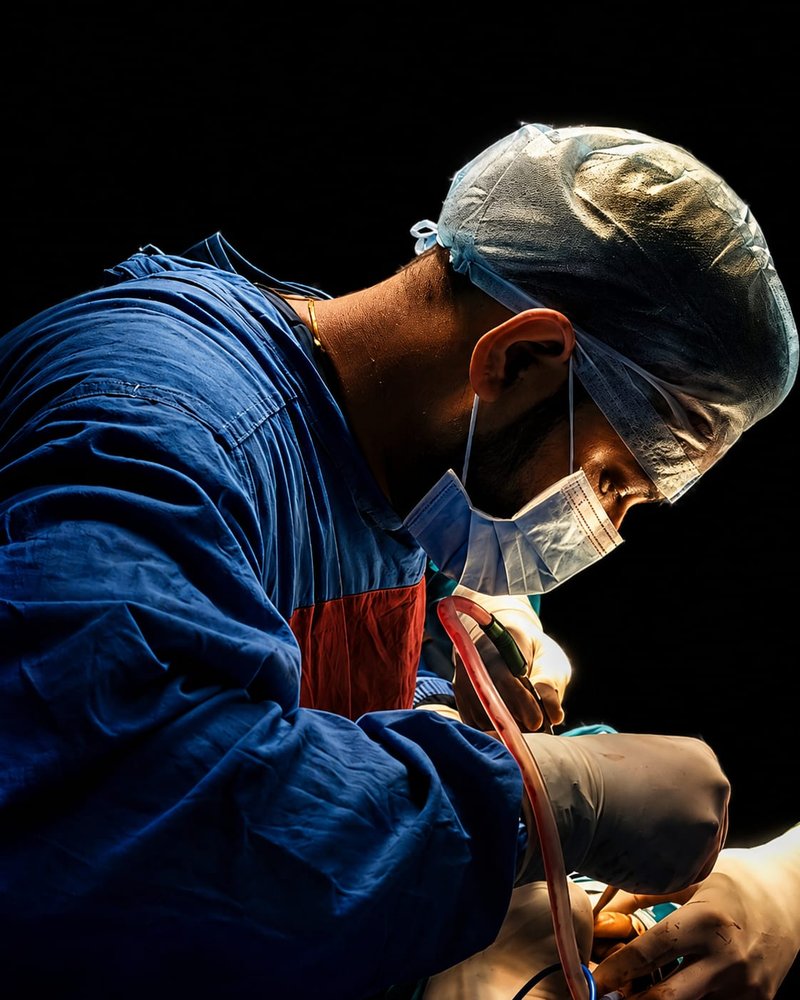 Dr. Gaurav, Oral & Maxillofacial Surgeon, performing a procedure